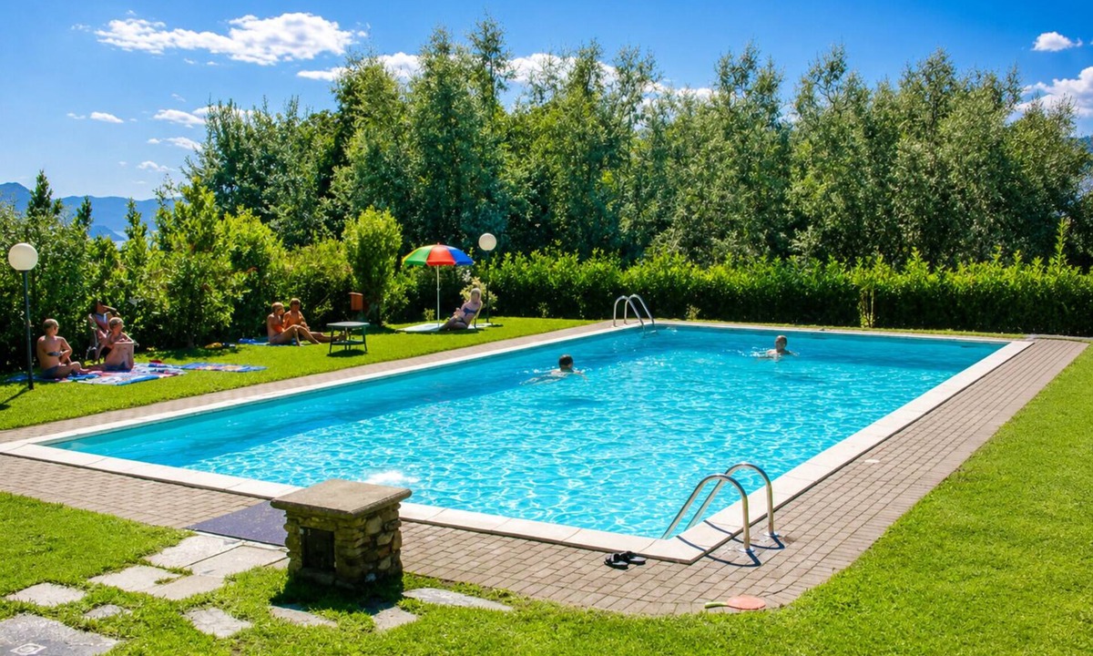 Agra Apartment | 3-room apartment with dream lake view in a residence with pool and sunbathing lawn