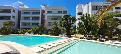 Las Terrenas Apartment | AMAR'E beach front apartment overlooking pool