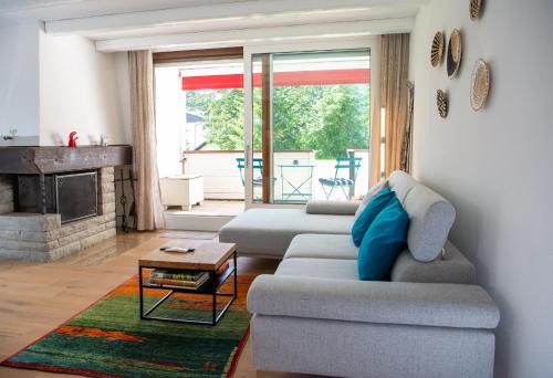 Lenzerheide Apartment | Apartment by Ski Lift with a Terrace