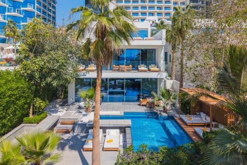 Palm Jumeirah Villa | FIVE Palm Beachfront Villa -Private Pool & Jacuzzi, Panoramic Views, by Exclusive Holiday Homes