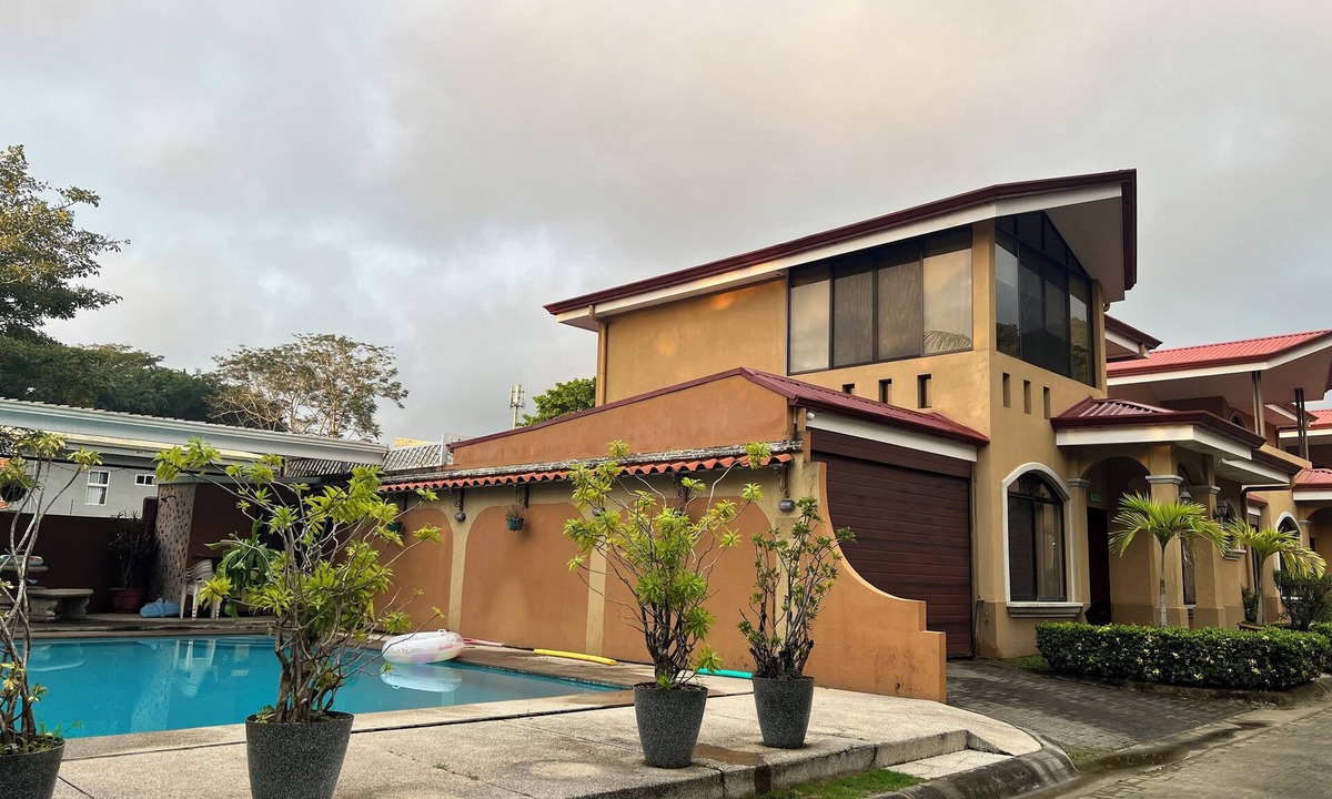 Cerro Plano House | Jaco Hideaway: 1 minute walk to direct beach access. Gated community with pool.