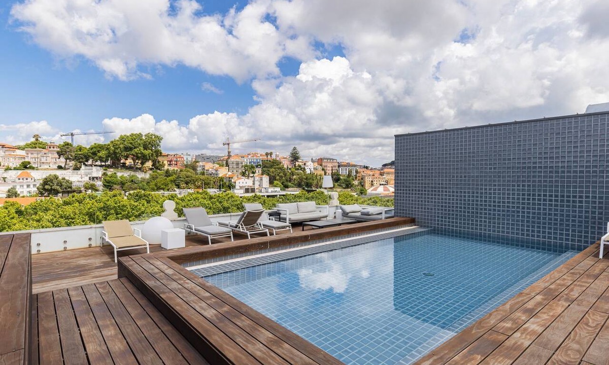 Sao Jose Apartment | Liberdade Elegance W/Rooftop Pool by LovelyStay