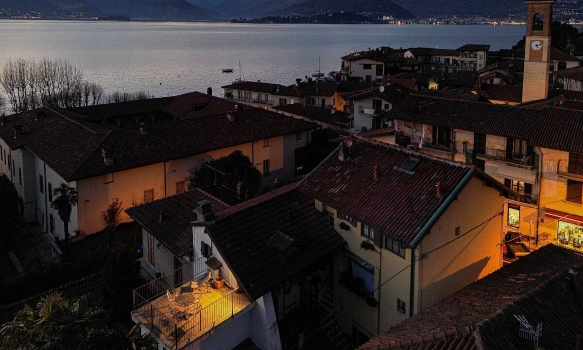 Cerro Apartment | Romantic Attic Retreat with Panoramic Terrace, Steps from the Lake