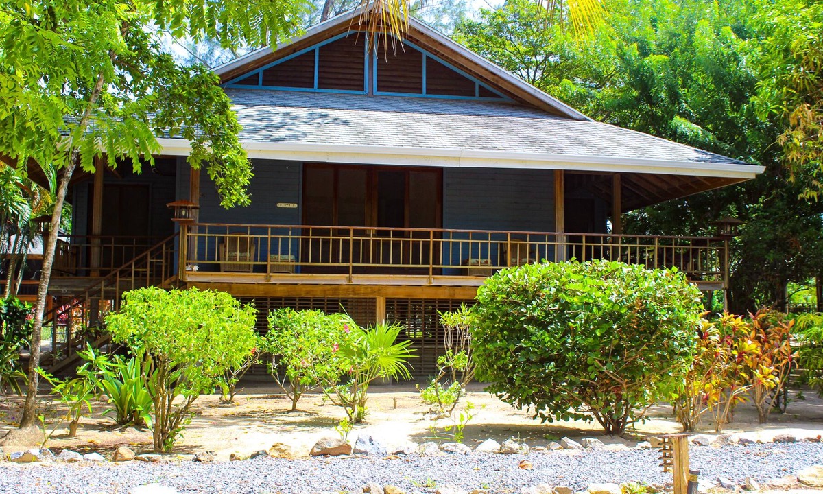 Palmetto Bay House | Tranquil Beachfront Bungalow In Private, Gated, Eco-Dive Resort Community.