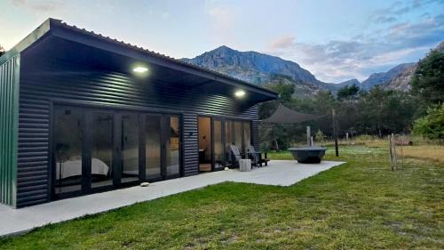 Wolseley Apartment | Tranquility - Cabin nestled in the mountains