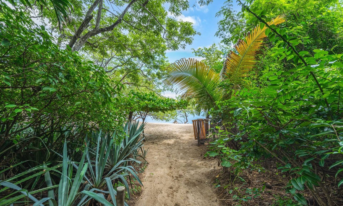 Playa Langosta Villa | Tropical Retreat - Private Pool, Steps To Beach 2 Bedroom Villa by RedAwning