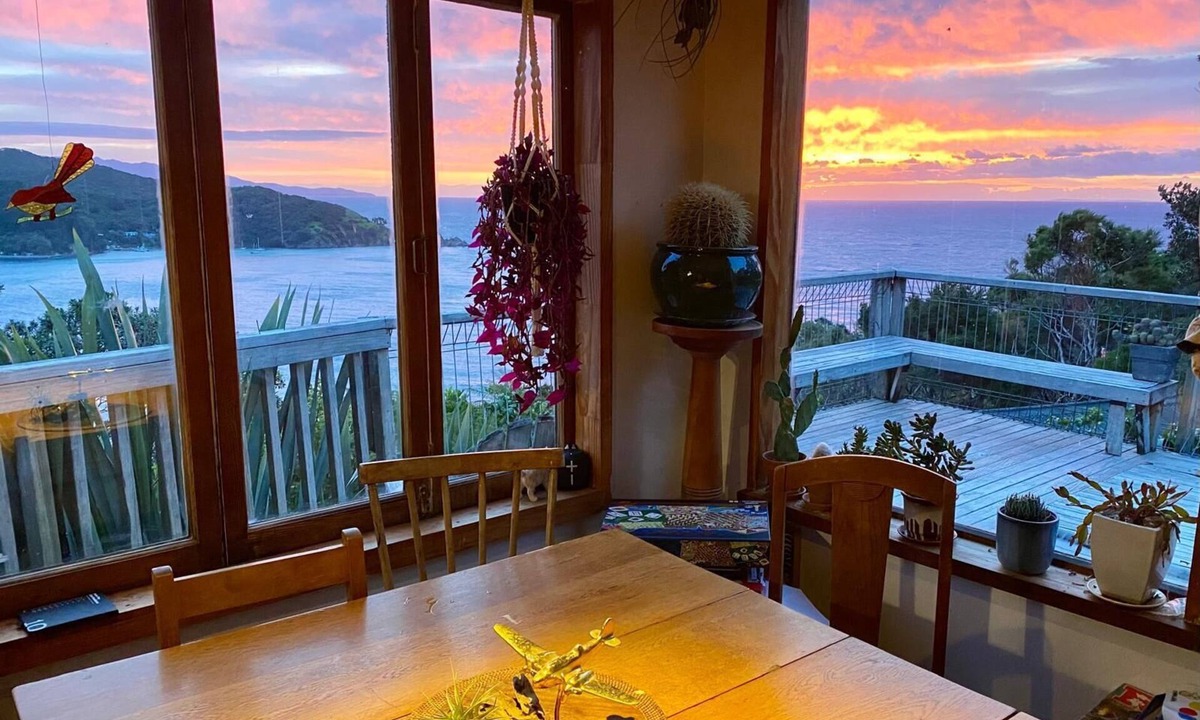 Tryphena House | Tryphena sunset and sea views! 5 minute walk to beaches, shops and restaurants.
