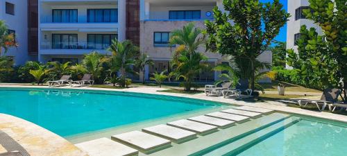 Las Terrenas Apartment | AMAR'E beach front apartment overlooking pool