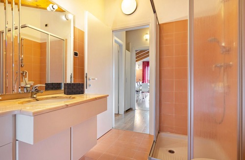 Torbole sul Garda Apartment | Apartment 'Attic Rosa with Private Terrace' with Mountain View, Wi-Fi and Air Conditioning