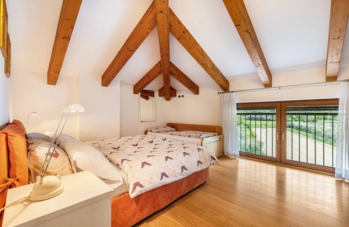 Torbole sul Garda Apartment | Apartment 'Attic Rosa with Private Terrace' with Mountain View, Wi-Fi and Air Conditioning