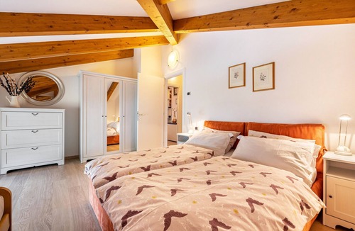Torbole sul Garda Apartment | Apartment 'Attic Rosa with Private Terrace' with Mountain View, Wi-Fi and Air Conditioning