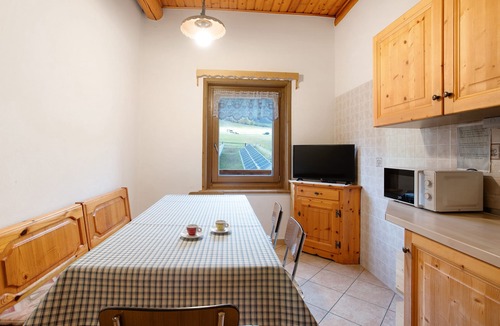 San Rocco Apartment | Apartment 'Baita Lorella Appartamento 8' with Mountain View, Shared Terrace and Wi-Fi
