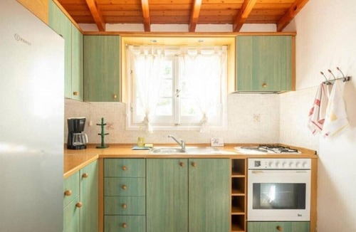 Ag. Georgios Apartment | Apartment 'Niovi One-Bedroom Bungalow - Split' with Shared Pool, Wi-Fi and Air Conditioning