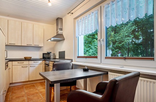 Ostseebad Prerow Apartment | Apartment 'Prerow Am Deich - Ferienwohnung 2' with Private Terrace and Wi-Fi