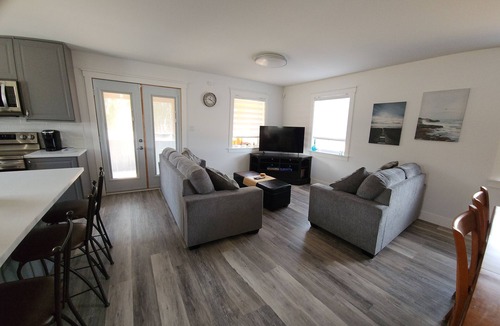 Grand-Digue House | Beausoleil Saltwater Sunsets RnR on Acadian Coast with WiFi, Hot Tub, Air Hockey
