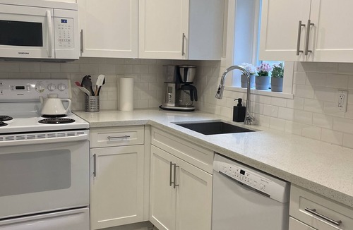Delta Condo | Bright, Cozy suite in quiet neighborhood close to amenities (Pet Friendly!)