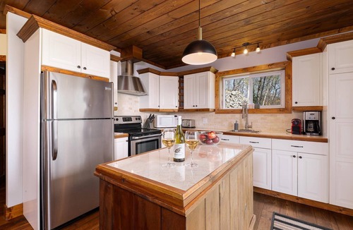 Petite-Riviere-Saint-Francois Ski Chalet | 61B Chalet: Garden Level, River Views & Spa