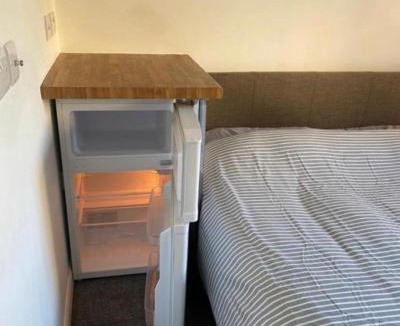 Corby House | City Vacations Corby near Rockingham Double en- suite room in shared property Communal kitchen & garden