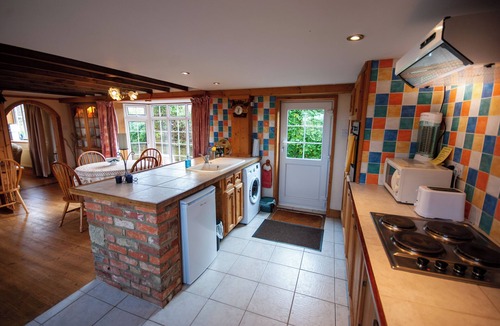 Merstone Cottage | Cosy converted barn in rural location with views of the surrounding countryside.