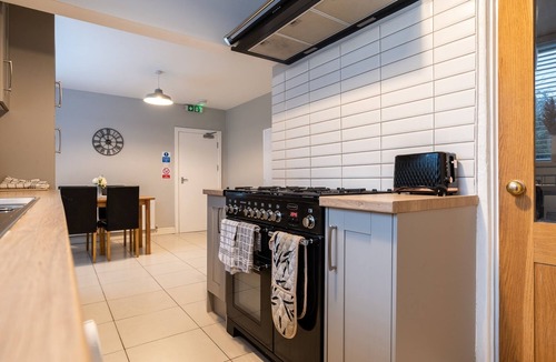 Castle Donington House | Double bedroom 1 with seating and work space