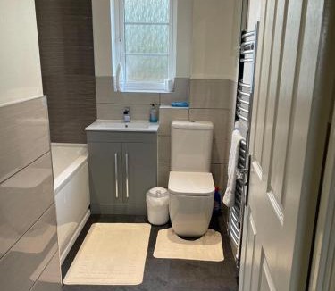Milton Malsor House | Double bedroom in a residential home with parking