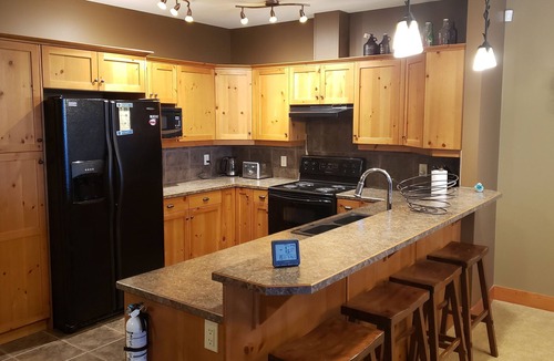 Snow Pine Estates Condo | Easy access Ski out condo with Hot Tub! Pet friendly.