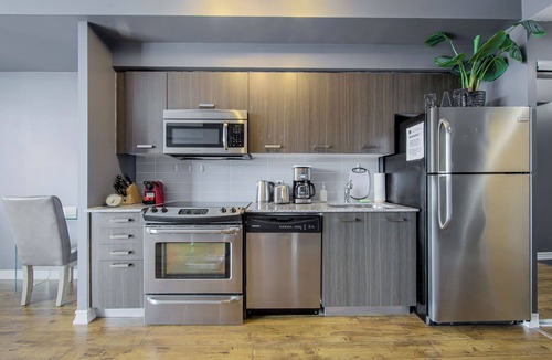 Bay Cloverhill Condo | Family Size 1 Bedroom Condo with BALCONY walk to SICK KIDS HOSPITAL. Sleeps 4