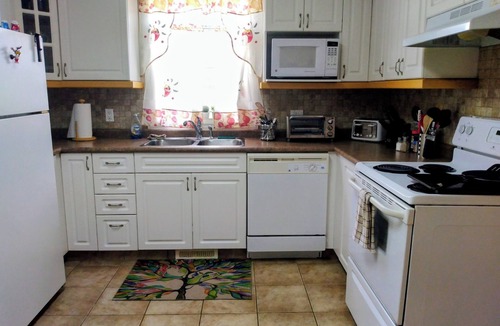 Dawson Creek House | Great location with ample parking makes this a great place to rest and relax.