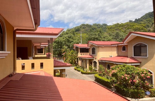 Cerro Plano House | Jaco Hideaway: 1 minute walk to direct beach access. Gated community with pool.
