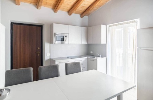 Orino Apartment | La Posteria - Penthouse 7 by iCasamia .it