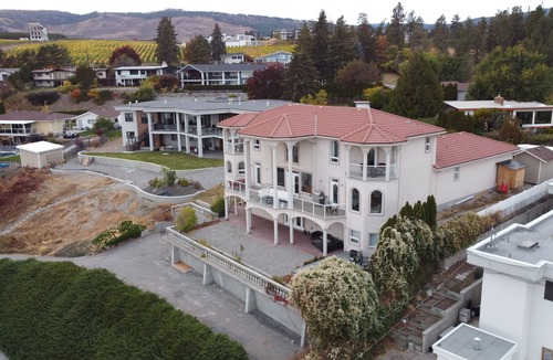 Westbank House | Lakeside Spanish Villa with 3 Patios + Hot Tub