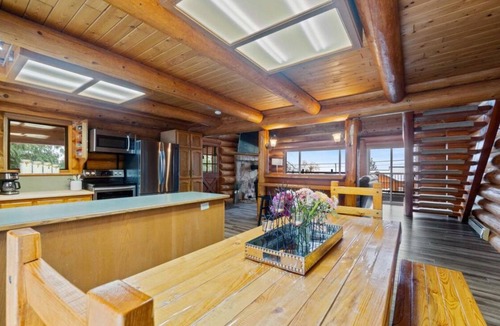 Magna bay Ski Chalet | Lakeview log cabin for large groups, 4 season fun! Beach access, buoy, hot tub