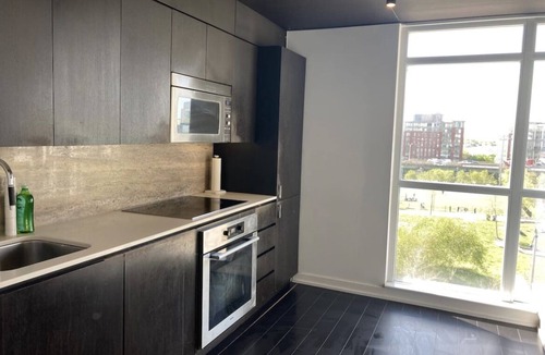 CityPlace Apartment | Large 2 Bedroom Condo, Downtown Toronto by Lake Ontario. With 2 Parking Spots.