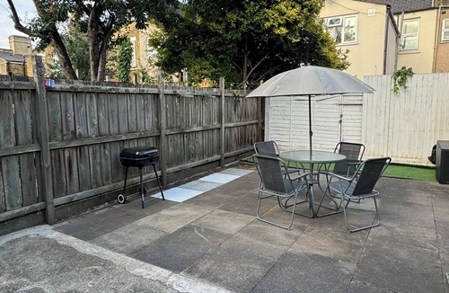 West Ham House | Large room with access to the garden