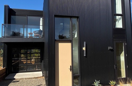 Courtenay House | Modern, sunny, eco retreat perched above a trendy jewelry studio!