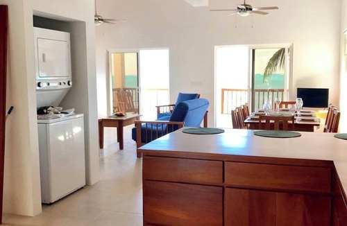 Caye Caulker Apartment | Oceanfront 3 bed/3 ba Penthouse Velento#1 private dock/pool/free paddleboards