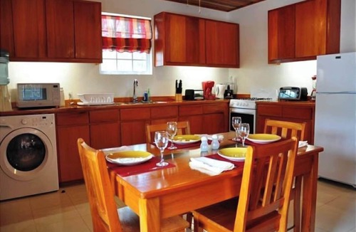 Caye Caulker Apartment | Oceanfront Unit w/dock/pool/AC-free paddle boards -2 bed, 1 bath sleeps 6
