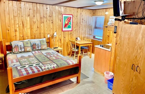 Blairmore Cabin | Quaint Riverside Cabin # 1