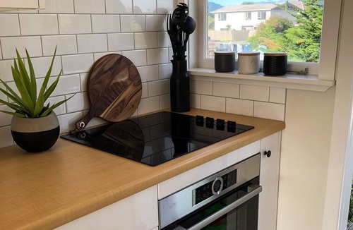 Paraparaumu Beach Apartment | RECENTLY RENOVATED PROPERTY RIGHT ON THE SAND! NEW DECK AND FREE WIFI!
