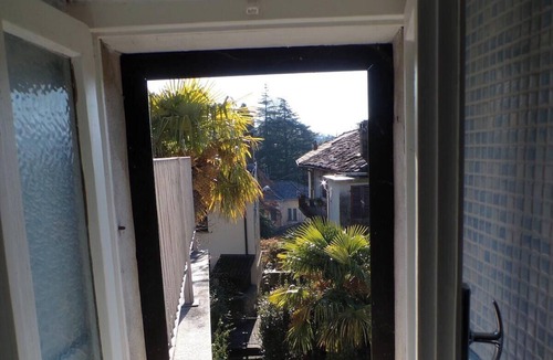 Cerro Apartment | Romantic Attic Retreat with Panoramic Terrace, Steps from the Lake