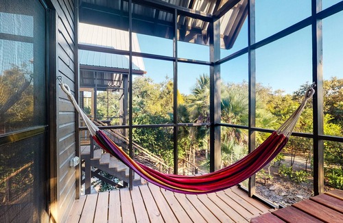 Surfside Cabin | Romantic cabana with veranda, hammock, partial AC & WiFi - walk to the beach