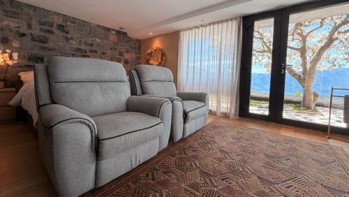 Cademario Apartment | ROMANTIC SUlTE WITH ITS OWN SPA AND OPEN VIEW TO LUGANO