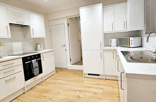 Bedford House | Spacious 5BR House Near Town | Kitchen, Dining & Lounge