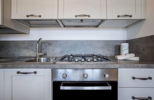 Toscolano Maderno Apartment | Studio Apartment 'Madeleine' with Mountain View, Pool and Wi-Fi