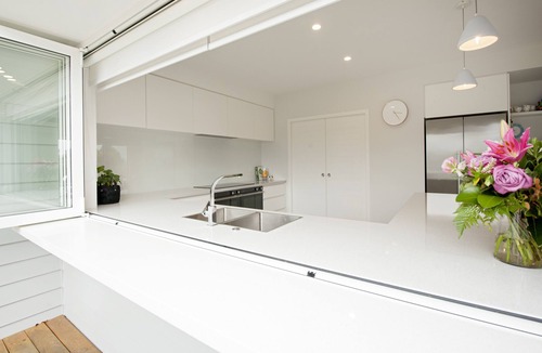 Richmond House | Sunny & spacious modern home with heated swimming pool.
