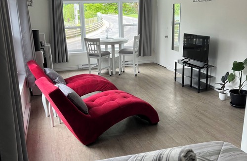 Coaticook Apartment | This studio gives you a front row view of Coaticook's illuminated bridge.