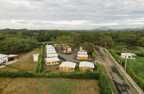 Canafistula House | Tiny Home #3 – 2BR Private Community Quiet Pool A/C WiFi Near Beach
