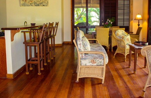 Palmetto Bay House | Tranquil Beachfront Bungalow In Private, Gated, Eco-Dive Resort Community.