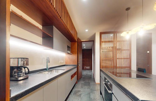 Zama Condo | Tranquil condo with a pool, fitness center, central AC, & patio