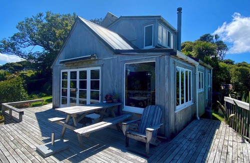 Tryphena House | Tryphena sunset and sea views! 5 minute walk to beaches, shops and restaurants.